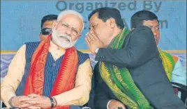  ?? PTI ?? Prime Minister Narendra Modi and Assam chief minister Sarbananda Sonowal at a public meeting to celebrate the signing of the Bodo Accord, in Kokrajhar, Assam, on Friday.