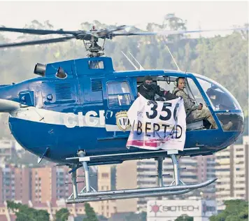  ??  ?? An accomplice waves a flag as Oscar Perez pilots a helicopter over Caracas Supreme Court. Above left, Perez on his Instagram account