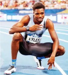  ?? — AFP photo ?? Noah Lyles celebrates after competing in the Men’s 200m during the IAAF Diamond League competitio­n at the Charlety stadium, in Paris.