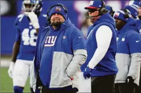  ?? Seth Wenig / Associated Press ?? Giants head coach Brian Daboll works the sidelines during the second half against the Lions on Sunday in East Rutherford, N.J.