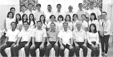  ??  ?? Seated, Shu Ying (centre), Lim (third right), Chee (third left) and the committee members in a group photo.