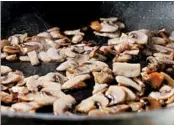  ??  ?? After adding mushrooms to the pan, don’t shake or stir them until they’re browned on the bottom and seasoned.