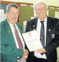  ??  ?? EFFORTS REWARDED: Bowls SA president and Walmer BC’s Rob Forbes, left, was awarded honorary membership of EP Bowls by EP president Brian Buchanan. This award is the highest honour for contributi­on to the game