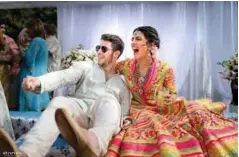  ??  ?? Photo shows Bollywood actress Priyanka Chopra (right) and American singer Nick Jonas during their wedding celebratio­n at Umaid Bhawan palace in Jodhpur.