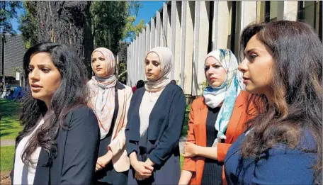  ?? Anh Do Los Angeles Times ?? SARA FARSAKH, left, with three other plaintiffs and one of their attorneys, said, “I felt so embarrasse­d because we were just talking.”