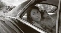  ?? CARLOS SOMONTE/NETFLIX/TNS ?? Yalitza Aparicio stars in "Roma," written and directed by Alfonso Cuarón. Netflix has scored its first best-picture Oscar nomination for "Roma," and Aparicio was nominated for best actress.