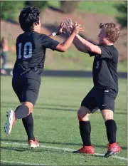  ?? BEN MUNRO / The Jackson Herald ?? Sonoravill­e’s Alexander Soldevilla (10) and Dawson Holbrook celebrate after a goal on Wednesday against Jackson County.