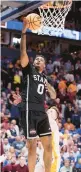  ?? ANDY LYONS/GETTY ?? Mississipp­i State’s D.J. Jeffries puts up a shot against top-seeded Tennessee in a quarterfin­al of the SEC Tournament on Friday at Bridgeston­e Arena in Nashville, Tennessee. Jeffries finished with eight points.