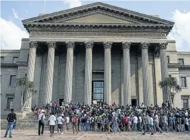  ?? Picture: Ihsaan Haffejee/Anadolu Agency/Getty Images ?? Wits students protest against tuition fees in 2015.