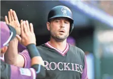  ?? RON CHENOY/USA TODAY SPORTS ?? Matt Holliday rejoined the Rockies in late August and is hitting .294 in 51 at-bats in 22 games.