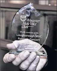  ??  ?? ■ Cut glass trophy awarded to Loughborou­gh Male Voice Choir by Worcester Male Voice Choir.