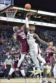  ?? DAVID BECKER / GETTY IMAGES ?? Luguentz Dort (shooting against Aric Holman of Mississipp­i State) leads No. 20 Arizona State in points per game with 22. He also has 16 steals.