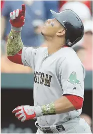  ?? AP PHOTO ?? HEAD’S UP: Marco Hernandez looks skyward after hitting his first career homer during yesterday’s win.