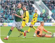  ??  ?? Hibernian’s Marc Mcnulty celebrates his goal