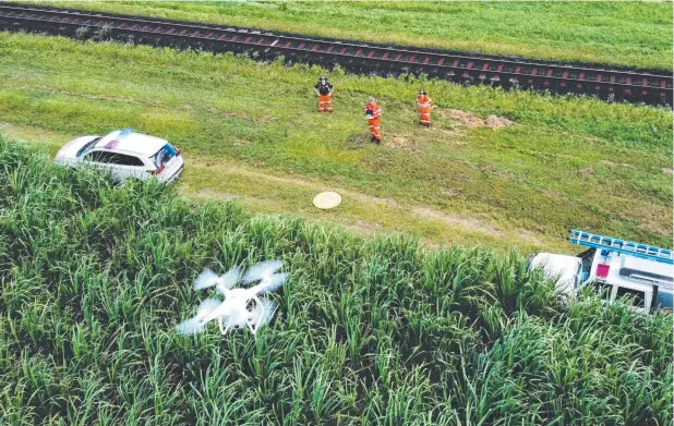  ?? Picture: BRENDAN RADKE ?? EYES IN SKY: The State Emergency Service have used four drone units in the ongoing search for missing man Daniel Tewake.