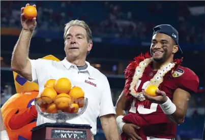  ?? WILFREDO LEE – THE ASSOCIATED PRESS ?? Alabama coach Nick Saban, left, put in quarterbac­k Tua Tagovailoa in the second half of last year’s national championsh­ip game as the Crimson Tide rallied to beat Georgia.