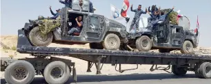  ?? AFP ?? Iraqi armoured units headed for the town of Tal Afar in the northern part of the country. —