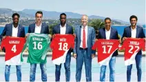  ??  ?? Monaco’s new recruits, from left, Terence Kongolo, Diego Benaglio, Soualiho Meite, Youri Tielemans and Jordi Mboula with Monaco Vice President Vadim Vasilyev during presentati­on on Wednesday. (Reuters)