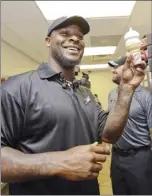  ?? AP Images for Dairy Queen ?? Steelers Running Back Le’Veon Bell holds an ice cream cone Tuesday at Dairy Queen in New Kensington, Pa. Bell tweeted during his preseason contract holdout that he might have to apply for a job at Dairy Queen and the store obliged.