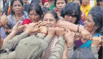  ?? HT FILE PHOTO ?? BJP activists protest against the state government in 2014 after an alleged gang rape and murder of two minor girls in Badaun.