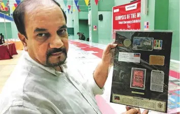  ?? Binsal Abdul Kader/Gulf News ?? Indian numismatis­t Sanjay N. Joshi with his currency collection exhibited at the UAE-India Fest organised by the Indian Social and Cultural Centre (ISC) in Abu Dhabi.