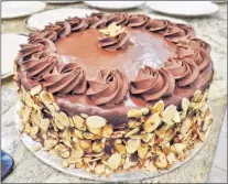  ??  ?? Our dessert of chocolate cake