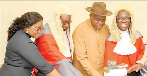  ??  ?? Wife of Bayelsa State Governor, Mrs. Patience Ama Zuofa- Douye Diri ( left); President, Customary Court of Appeal, Justice Daniel Ayah; Governor Douye Diri and the state’s Chief Judge, Kate Abiri at the celebratio­n of this year’s legal year in Yenagoa… yesterday
