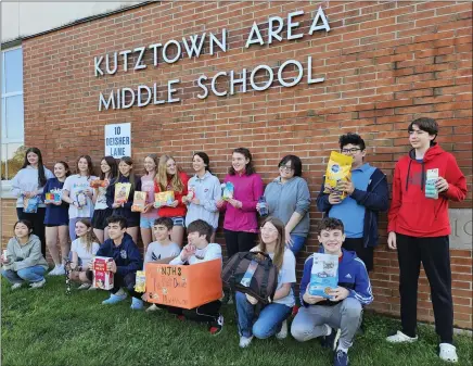  ?? PHOTO COURTESY OF JAMES REECE, FRIEND INC. ?? The Kutztown Middle School Honor Society held a Pet Pantry Drive to collect donations for Friend Inc.’s pet pantry. Top row: Ava Adam, Emma Vazquez, Lauren Perella, Norah Fegely, Jessica Sherrer, Emma Zimmerman, Maya McGranahan, Zayneb Scherer, Katelyn Berger, Genavieve O’Sullivan, Vincent Illustre and Camden Wessner. Bottom row: Manami Furuoka , Megan Hoffman, Dayne Losito, Ethan Herrlin, Jaxson Hilliard, Kensington Burns and Gavin Hottenstei­n.