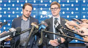  ?? NATHAN DENETTE THE CANADIAN PRESS ?? Toronto Maple Leafs centre Auston Matthews, left, and general manager Kyle Dubas reached a five-year extension that will allow enough salary-cap flexibilit­y to keep the team’s core together.