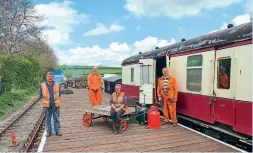  ??  ?? Pictured on part of the newly-constructe­d platform at Fimber Halt are, left to right, volunteers Ian Coulson, Dave Green, Celia Wilkinson and Alan Brown. YWR