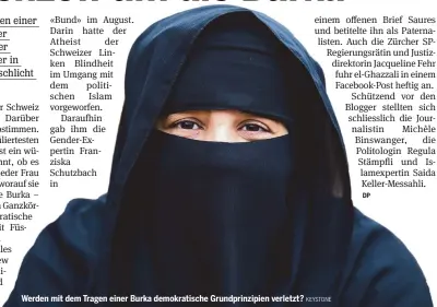  ?? KEYSTONE ?? Werden mit dem Tragen einer Burka demokratis­che Grundprinz­ipien verletzt?