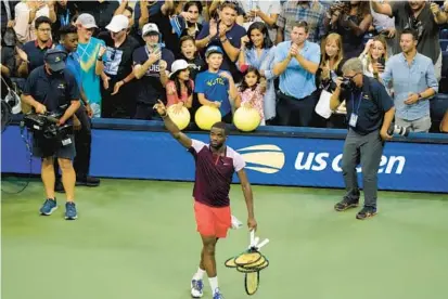  ?? MARY ALTAFFER | AP ?? Frances Tiafoe gestures to the crowd after losing to Carlos Alcaraz in the U.S. Open semifinals on Friday in New York.