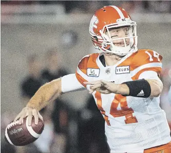  ?? CANADIAN PRESS FILE PHOTO ?? British Columbia Lions quarterbac­k Travis Lulay throws a pass during Canadian Football League action against the Alouettes in Montreal last Friday night. The veteran QB is hurt once again.