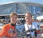  ?? MARTIN HENDRICKS ?? Ed Demyan poses for a photo with his fiancée, Mary Kaye Mackulin, as they attend Super Bowl XLV between the Packers and Steelers.