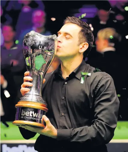  ?? Picture: Richard Sellers/PA ?? Ronnie O’Sullivan celebrates winning the UK Championsh­ip for the seventh time