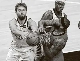  ?? Michael Conroy / Associated Press ?? DeMarcus Cousins, right, said little about his ejection from Monday’s loss to Dallas. He started at center in place of resting ChristianW­ood onWednesda­y.