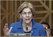  ?? SUSAN WALSH / ASSOCIATED PRESS ?? Sen. Elizabeth Warren, D-Mass., was listed as a minority from 1986-95 in a law professor directory just before she joined Harvard Law School. Charles Fried, a Harvard law professor who recruited her, said her ethnicity had nothing to do with how she...