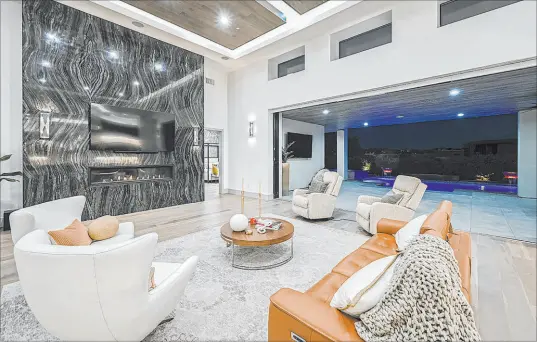  ?? Simply Vegas ?? Las Vegas Raiders General Manager Tom Telesco’s $4.95 million purchase for a Summerlin home in The Ridges highlighte­d March’s luxury home sales.