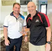  ?? ?? D grade Drouin golf champion David Axford (right) is congratula­ted on his win last Saturday by club captain Glenn Robinson.