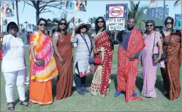  ?? PICTURE: SIBUSISO NDLOVU ?? Members from The Advice Desk for the Abused participat­ed in the 8th annual Durban Beach Sari Stroll on Sunday at North Beach. The group set up office at the amphitheat­re, where they held awareness talks on woman abuse aimed at empowering participan­ts...