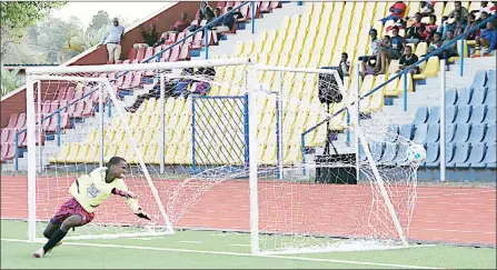  ?? (Pic: Machawe Fakudze) ?? Gables PnP Store goalkeeper watches the ball kissing the net.