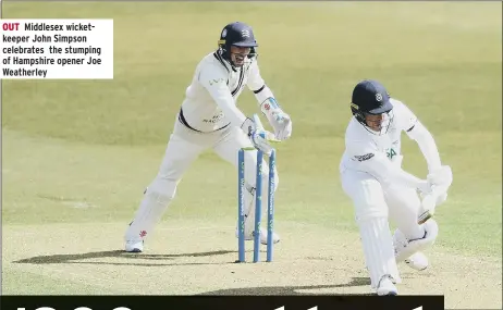  ??  ?? OUT Middlesex wicketkeep­er John Simpson celebrates the stumping of Hampshire opener Joe Weatherley