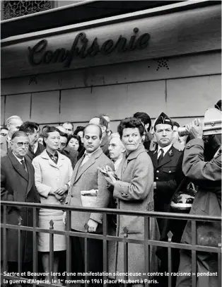  ??  ?? Sartre et Beauvoir lors d’une manifestat­ion silencieus­e « contre le racisme » pendant la guerre d’Algérie, le 1er novembre 1961 place Maubert à Paris.