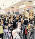  ??  ?? TRACK OF LIES: NJ Transit commuters wait for trains Friday at Penn Station when service was still delayed after Monday’s derailment.