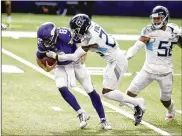  ?? BRUCE KLUCKHOHN / AP ?? Vikings quarterbac­k Kirk Cousins (8) is sacked by Titans cornerback Kristian Fulton on Sunday inMinneapo­lis. Cousins threwthree touchdowns in a 31-30 loss but also twomore intercepti­ons.