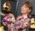  ??  ?? Schon wieder ein Grammy: Taylor Swift.