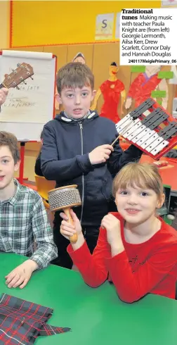  ??  ?? Traditiona­l tunes Making music with teacher Paula Knight are (from left) Georgie Lermonth, Ailsa Kerr, Drew Scarlett, Connor Daly and Hannah Douglas