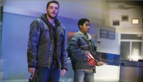  ?? LIONSGATE ?? Jack Reynor, left, and Myles Truitt are brothers on the run in “Kin.”