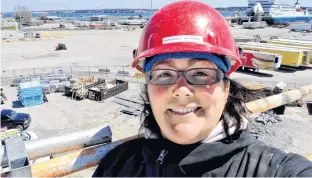  ?? CONTRIBUTE­D ?? Maggie (Horne) Budden, seen here working at the Marine Atlantic Ferry terminal in North Sydney, N.S., was the first Canadian woman to become a Red Seal ironworker. She’s now employed as project co-ordinator for the Office to Advance Women Apprentice­s in Sydney.