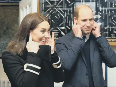 ?? PICTURE: PA ?? The Duke and Duchess of Cambridge shield their ears during a visit to the Acme whistle company. PITCH BATTLE: